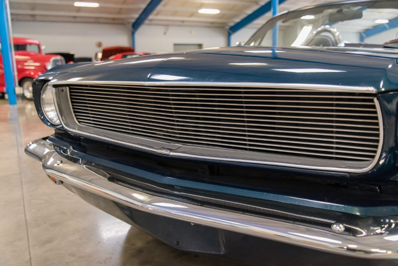 Illustration for article titled I Dunno About This 1997 Miata That's Been 'Converted' Into A 1965 Mustang